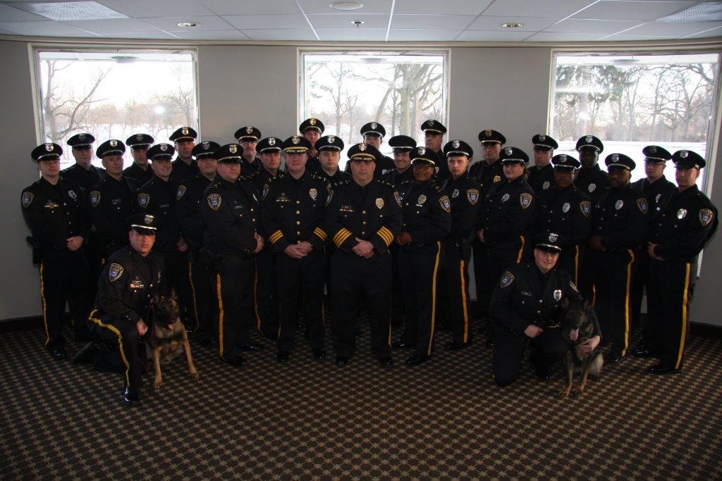 group of police officers posing for a photo